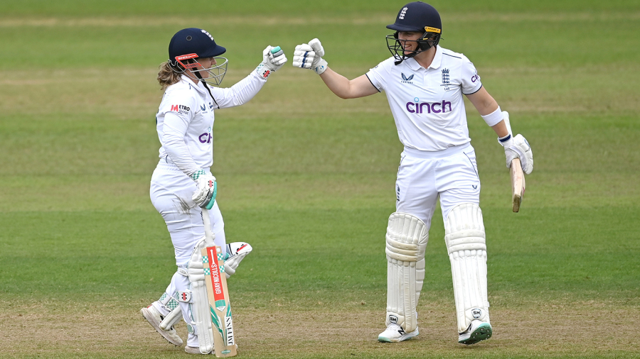 NOTTINGHAM, ENGLAND - JUNE 23: Tammy Beaumont of England celebrates reaches her half century with captain Heather Knight during day two of the LV= Insurance Women's Ashes Test match between England and Australia at Trent Bridge on June 23, 2023 in Nottingham, England. (Photo by Gareth Copley/Getty Images)