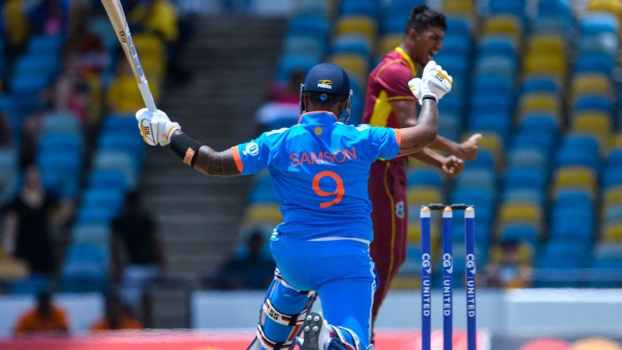 Sanju Samson (L) of India lbw by Gudakesh Motie (R) of West Indies during the first One Day International (ODI) cricket match between West Indies and India, at Kensington Oval in Bridgetown, Barbados, on July 27, 2023. (Photo by Randy Brooks / AFP) (Photo by RANDY BROOKS/AFP via Getty Images)