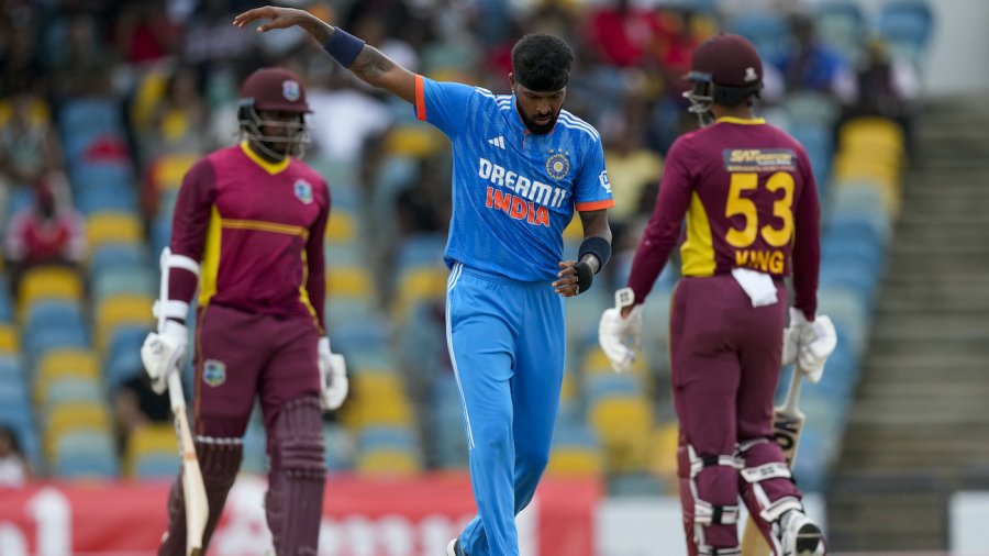 India's captain Hardik Pandya bowls against West Indies's openers Kyle Mayers and Brandon King during the second ODI cricket match at Kensington Oval in Bridgetown, Barbados, Saturday, July 29, 2023. (AP Photo/Ricardo Mazalan)