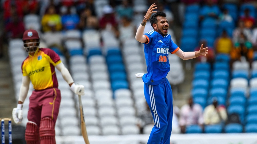 Yuzvendra Chahal (R) of India celebrates the dismissal of Brandon King (L) of West Indies during the first T20I match between West Indies and India at Brian Lara Cricket Academy in Tarouba, Trinidad and Tobago, on August 3, 2023. (Photo by Randy Brooks / AFP) (Photo by RANDY BROOKS/AFP via Getty Images)