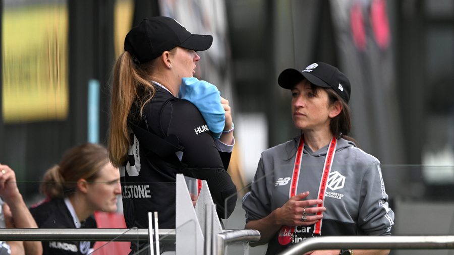 MANCHESTER, ENGLAND - AUGUST 23: Originals captain Sophie Ecclestone gets treatment after picking up a match ending injury during The Hundred match between Manchester Originals Women and Southern Brave Women at Emirates Old Trafford on August 23, 2023 in Manchester, England. (Photo by Stu Forster/Getty Images)